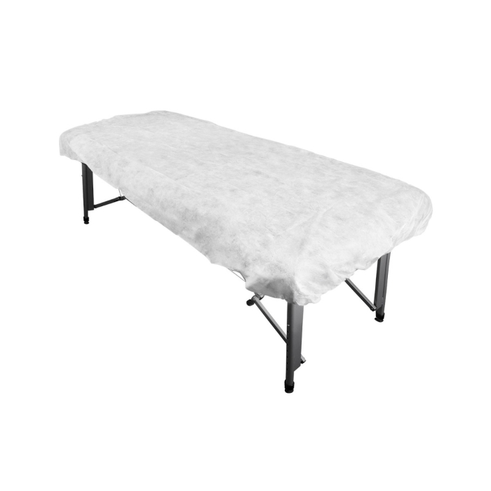 Un paquet de 10 housses de table jetables ajustées couvre une table de massage portable avec pieds en métal noir et design simple, isolée sur fond blanc.